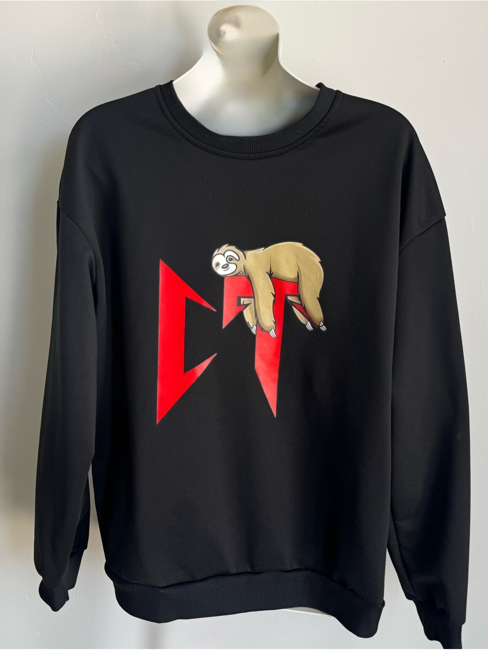 Black Crewneck Sweater with Red Graphic and Sloth Motif